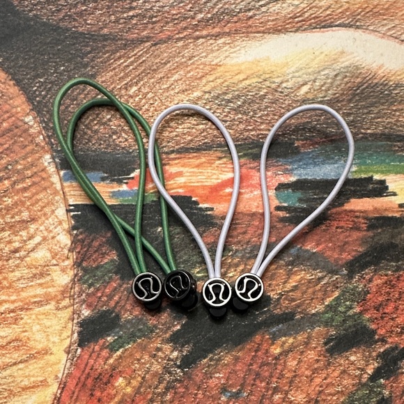 lululemon athletica Accessories - lululemon athletica zipper pull or Hair Ties green and white